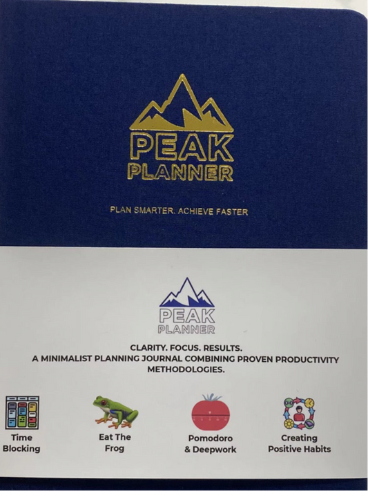 Peak Planner A5 navy blue hard cover with gold logo and methodology band

